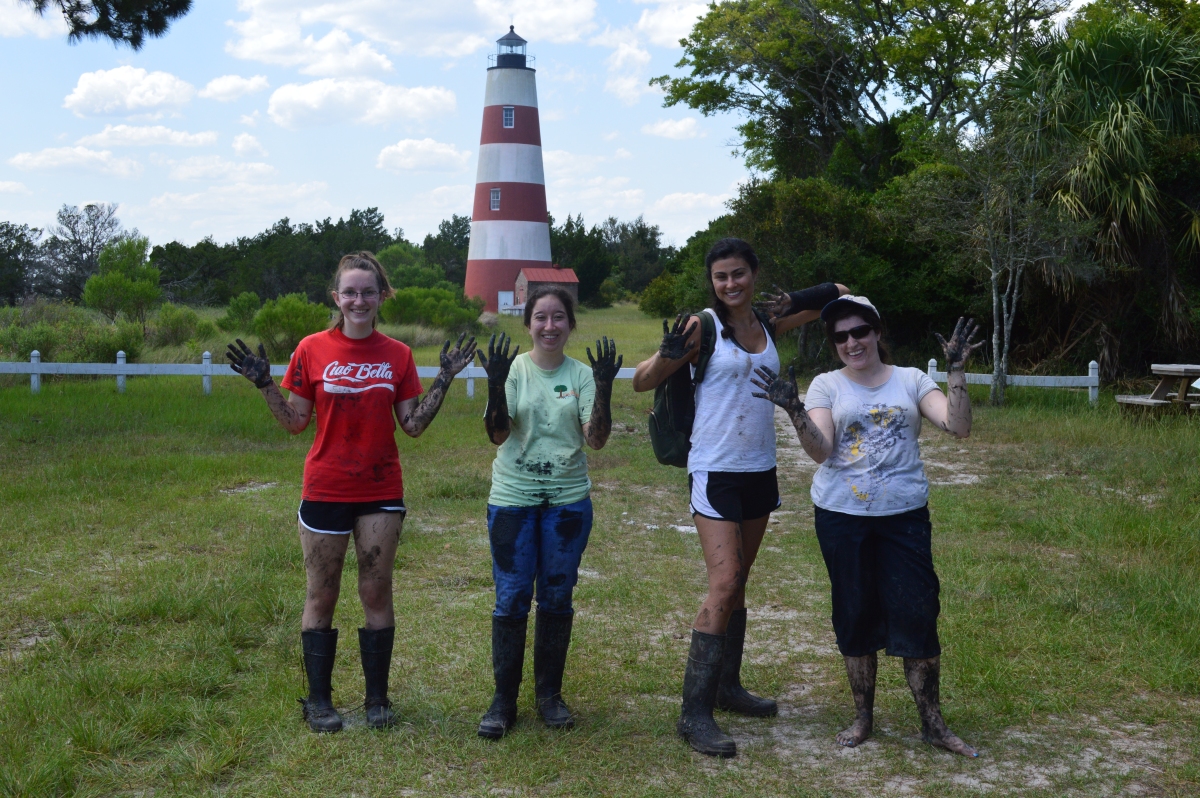 A research excursion on Sapelo Island. Pictured (left to right): Chloe Stanton (Earth & Atmospheric Sciences (EAS) undergraduate student), Amanda Cavazos (Earth & Atmospheric Sciences (EAS) graduate student), Melissa Warren (Earth & Atmospheric Sciences (EAS) graduate student), Jennifer Glass (Earth & Atmospheric Sciences (EAS) assistant professor, Biogeochemistry)