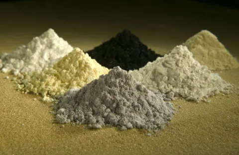 Piles of rare earth oxides praseodymium, cerium, lanthanum, neodymium, samarium and gadolinium. Peggy Greb/USDA-ARS