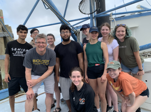 School of Biological Sciences Associate Professor Brian Hammer (2nd from left), teaching assistant Ahn Pham (3rd from left) and nine 2022 Aquatic Chemical Ecology (ACE) REU students on a trawl along the Georgia coast.
